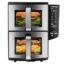 Stainless steel double-drawer air fryer with a digital control panel on the right; top drawer shows salmon and vegetables, bottom drawer shows chicken and fries.