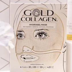 Front of a Gold Collagen hydrogel mask box featuring a line-drawn woman's face and product tagline.