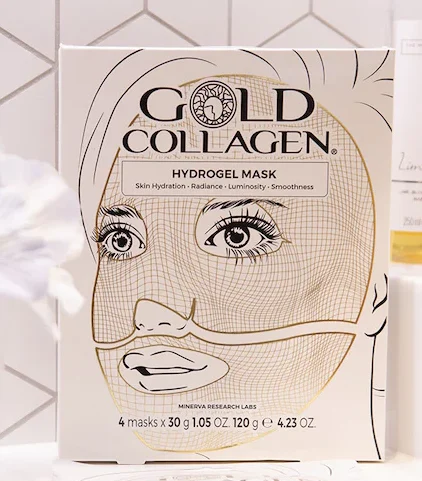 70153198_2442602532492842_2905158901701804032_n_1647444888 - Radau Viska Front of a Gold Collagen hydrogel mask box featuring a line-drawn woman's face and product tagline.