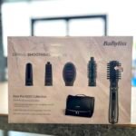 Box of BaByliss Style Pro 1000 Collection hair styling set with brushes and attachments visible front.
