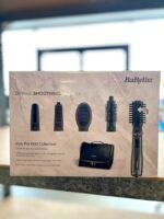 Box of BaByliss Style Pro 1000 Collection hair styling set with brushes and attachments visible front.