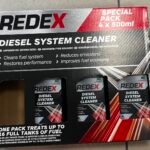Redex Diesel System Cleaner special pack box (4 x 500ml) on a tiled floor.