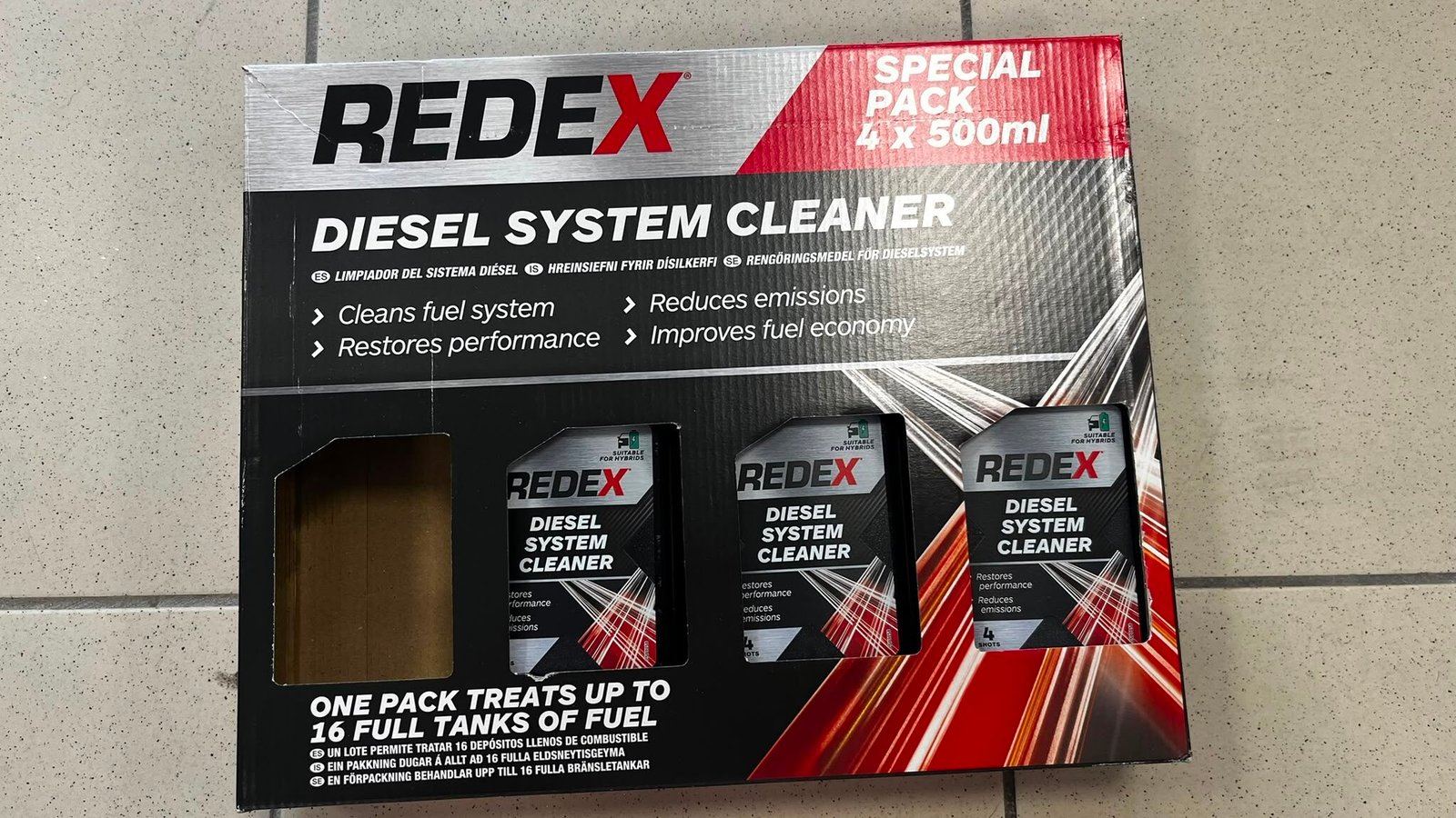 WhatsApp Image 2026-07-31 at 134557 - Radau Viska Redex Diesel System Cleaner special pack box (4 x 500ml) on a tiled floor.
