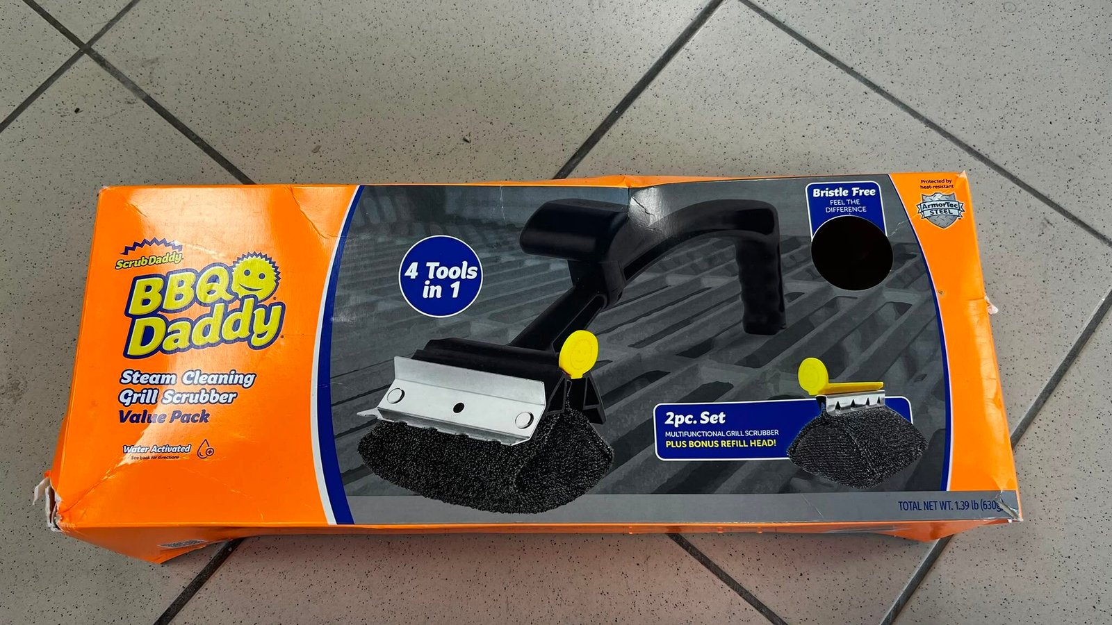 WhatsApp Image 2026-07-31 at 135135 - Radau Viska Orange packaging box for a 4-in-1 car cleaning/polishing kit, showing a foam polishing pad and attachment on the front panel