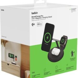 Boxed Belkin BoostCharge Pro 3-in-1 magnetic charging stand packaging with image of a wireless charger and devices (phone, Apple Watch, AirPods) on a green accent panel; shows 15W fast wireless charging and compatible components.