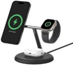 Multi-device charging dock charging iPhone, Apple Watch, and AirPods on a circular base with green charging indicators.