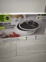 Box for GreenPan sauté pan with glass lid, ceramic non-stick coating, 6-quart capacity, shown on a light floor/counter.