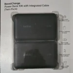 Front of Belkin BoostCharge Twin Pack box showing two black 10K power banks with integrated cable and Belkin branding.