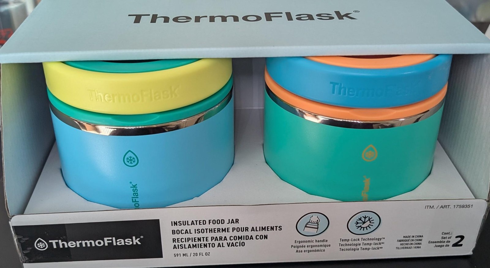 sl8g78jlg2ch1 - Radau Viska Two-tone ThermoFlask insulated food jars in a display box with teal and blue bases and yellow/orange lids, brand name visible on top box edge.