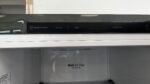 LG Smart Inverter refrigerator control panel displaying modes like Vacation and Fridge with a temperature scale and Express Cool option