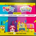 Colorful Number Blocks wipe-clean books box set for learning numbers and letters, bright yellow packaging visible.
