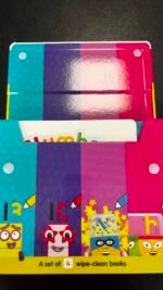 Bright, colorful cover of a set of 4 wipe-clean books for kids, with cartoon characters and bold color blocks at the bottom reading 'A set of 4 wipe-clean books'