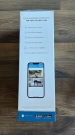 Box packaging for Eufy Security app with feature list and a phone screen showing the app interface on the lower half of the box.