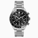 Tag Heuer Carrera chronograph watch with black dial and stainless steel bracelet, showing three subdials and tachymeter bezel.